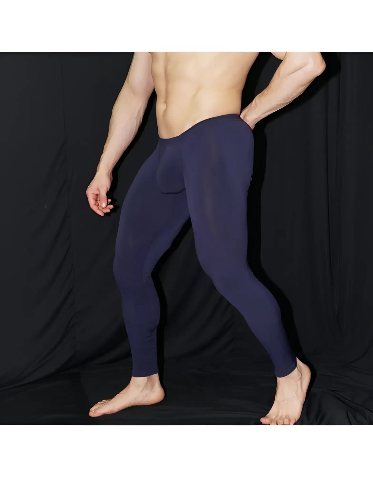 Navy blue form-fitting Arroyman bulge runner tights rnR006s men’s sculpted performance leggings shown from the back