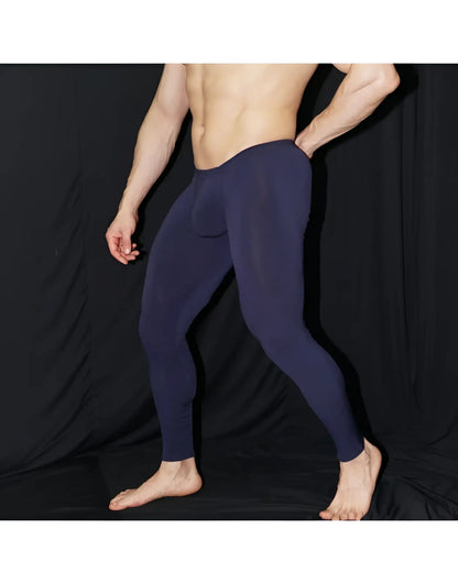 Navy blue form-fitting Arroyman bulge runner tights rnR006s men’s sculpted performance leggings shown from the back