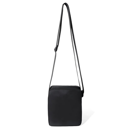 Black athletic crossbody bag with rectangular shape and adjustable matching strap for hands-free use