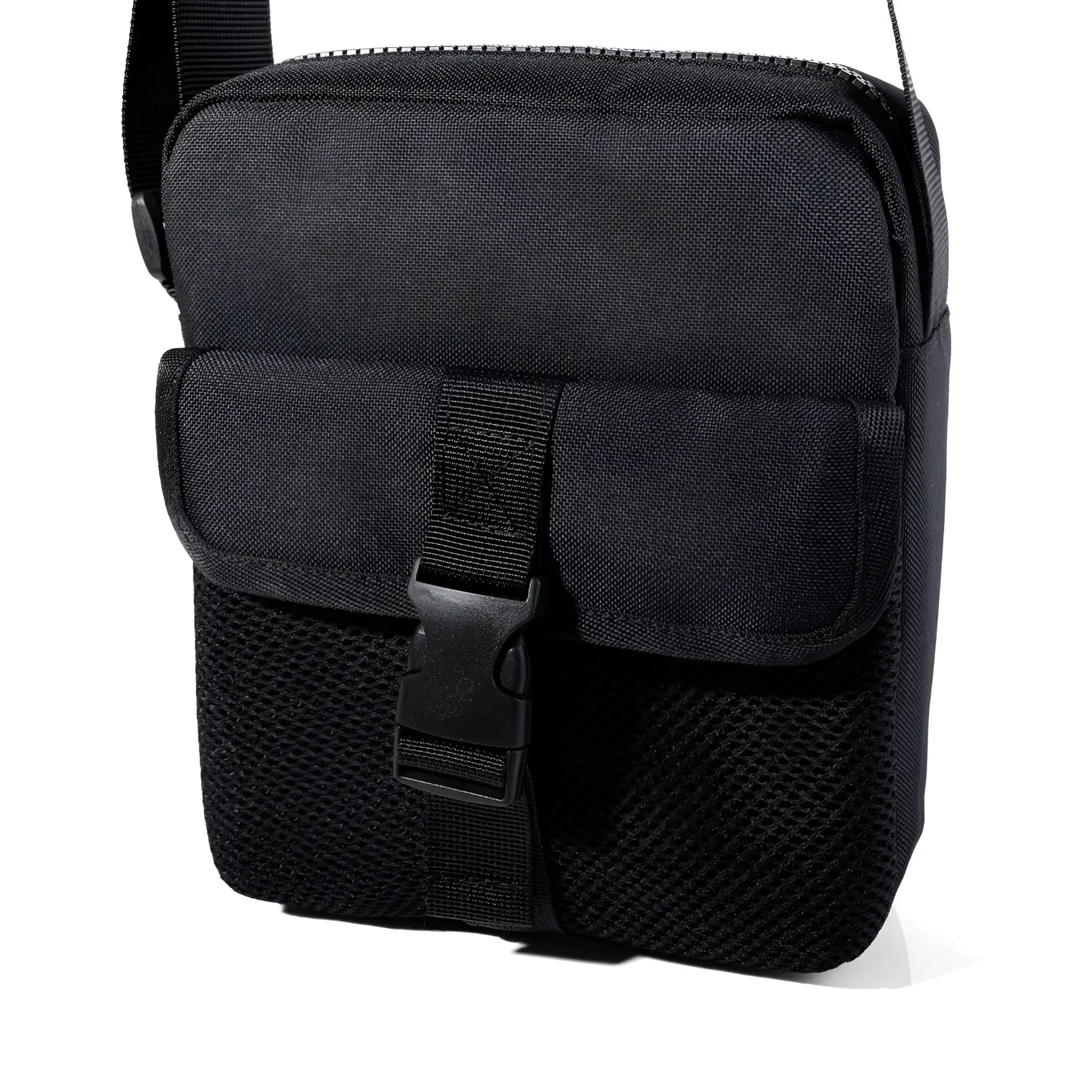 Black athletic crossbody bag featuring mesh panels and buckle closure designed for tactical and everyday use