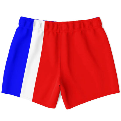 Red swim shorts with blue and white side panels made of quick-dry material by Maris Equi.