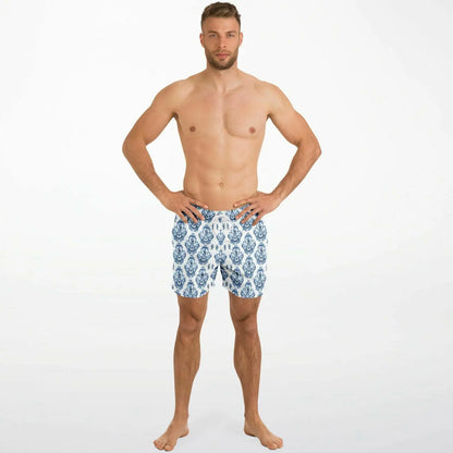 Men's swim shorts in blue and white baroque pattern made by Maris Equi featuring an elastic waistband and side pockets.