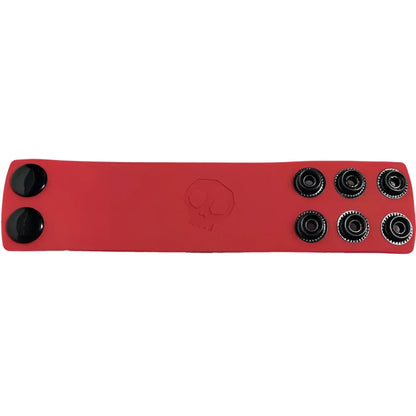 Red leather ball strap wristband with black snap buttons and debossed skull emblem