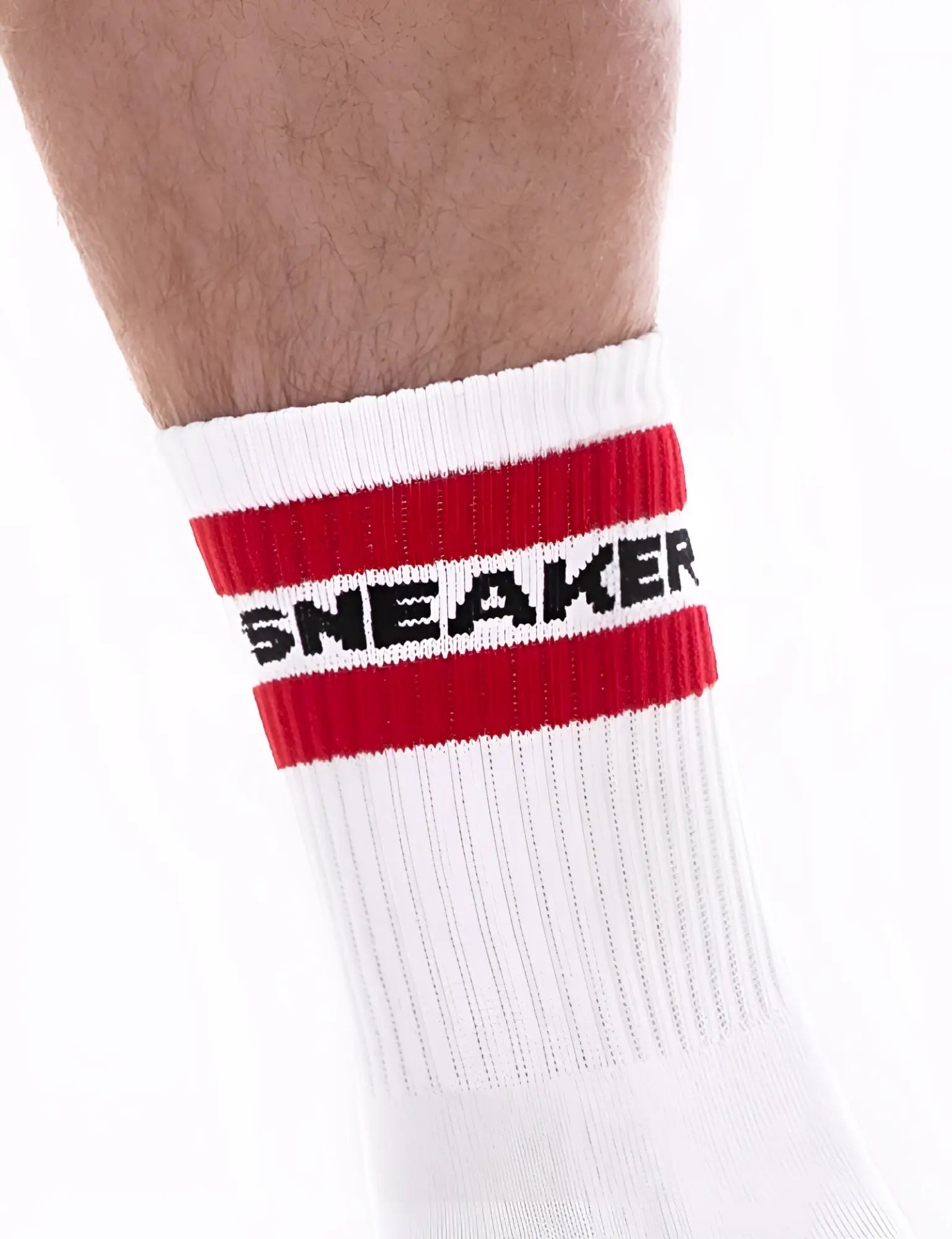 White athletic sneaker half sock with bold red stripe and black sneaker lettering on cuff by barcode berlin