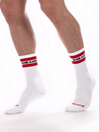 White barcode berlin fetish sneaker half socks with red and black branding on cuff size s/m