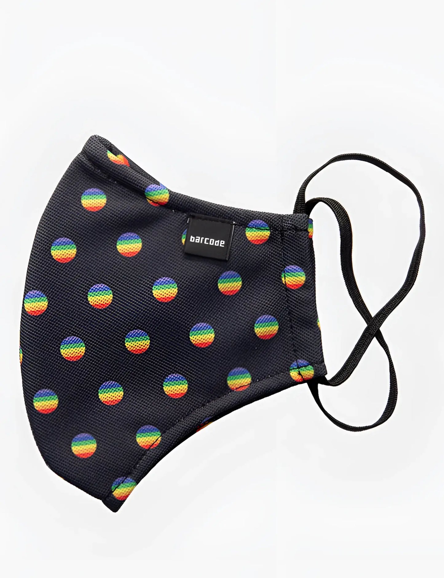 Black fabric face mask by barcode berlin with rainbow circular patterns and black elastic ear loops unisex one size