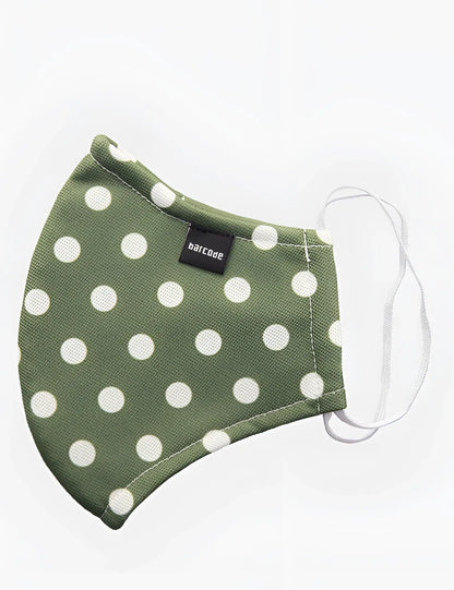 Olive green fabric face mask with white polka dots and black barcode brand tag by barcode berlin unisex one size