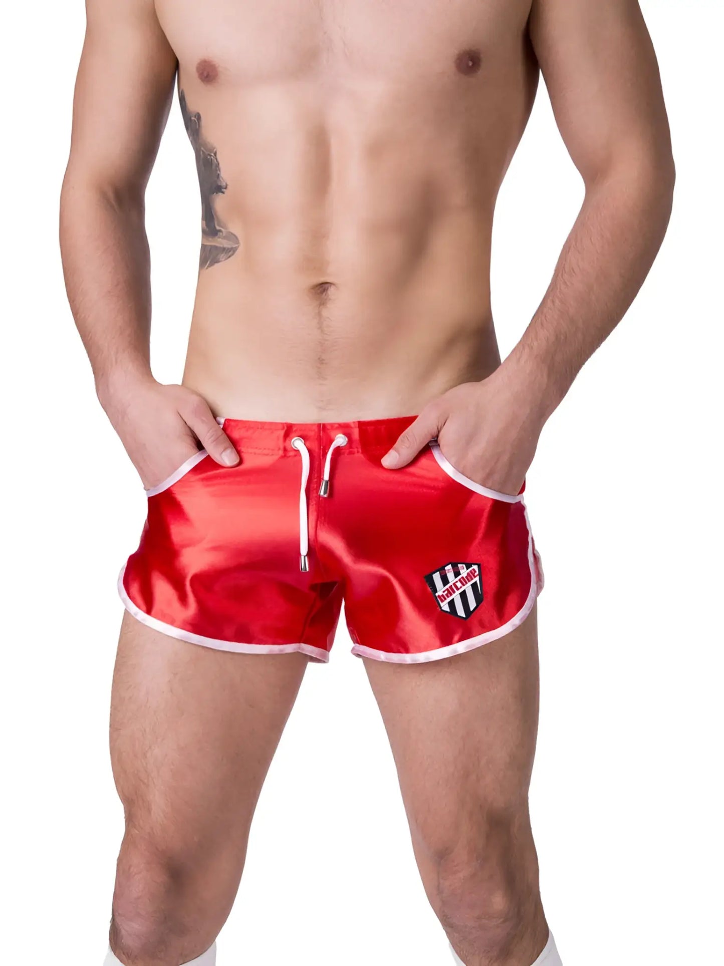 Red satin swim trunks with white trim and black and white shield logo on the left leg by Barcode Berlin size XL