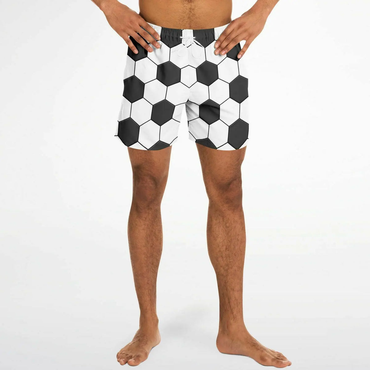 Men's swim shorts by Maris Equi featuring a black and white hexagonal pattern lightweight material and elastic waistband.