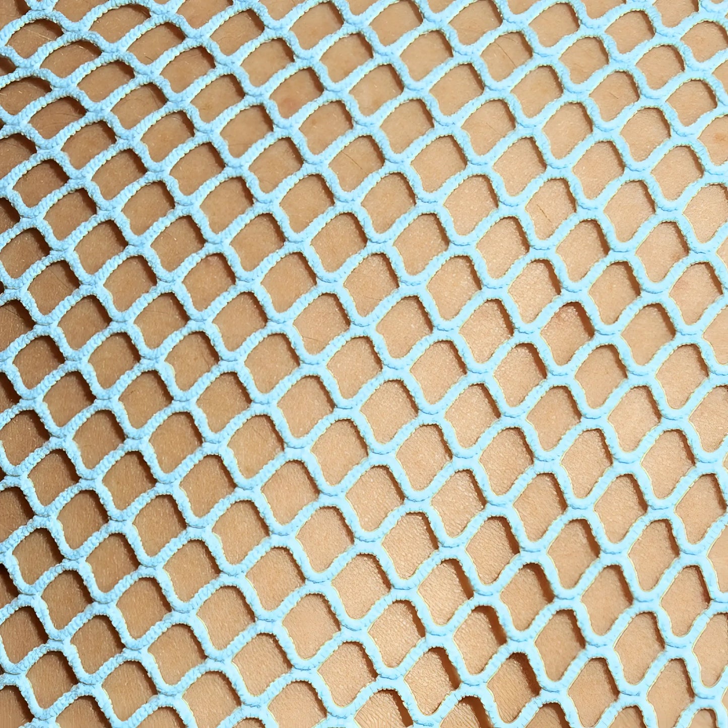 Light blue mesh fabric with diamond-shaped pattern on beachy net tank top front side for beachwear