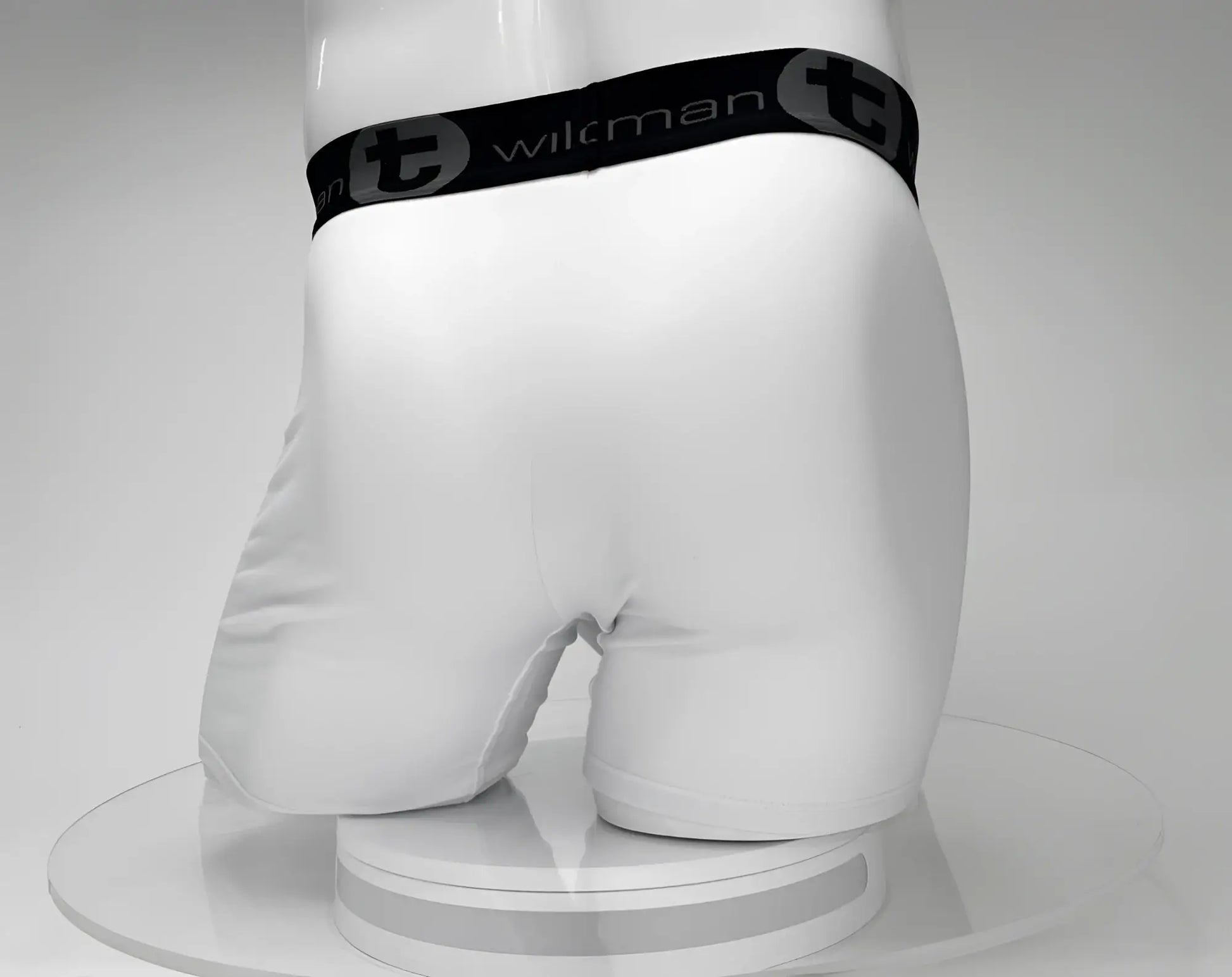White big boy pouch 5 inch inseam boxer brief with black wilman logo waistband and circular t emblem