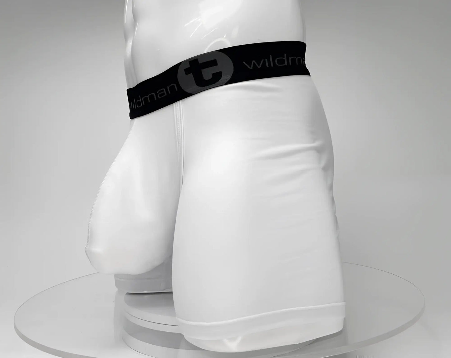 White men’s big boy pouch 5 inch inseam boxer brief with black elastic waistband featuring wildman logo