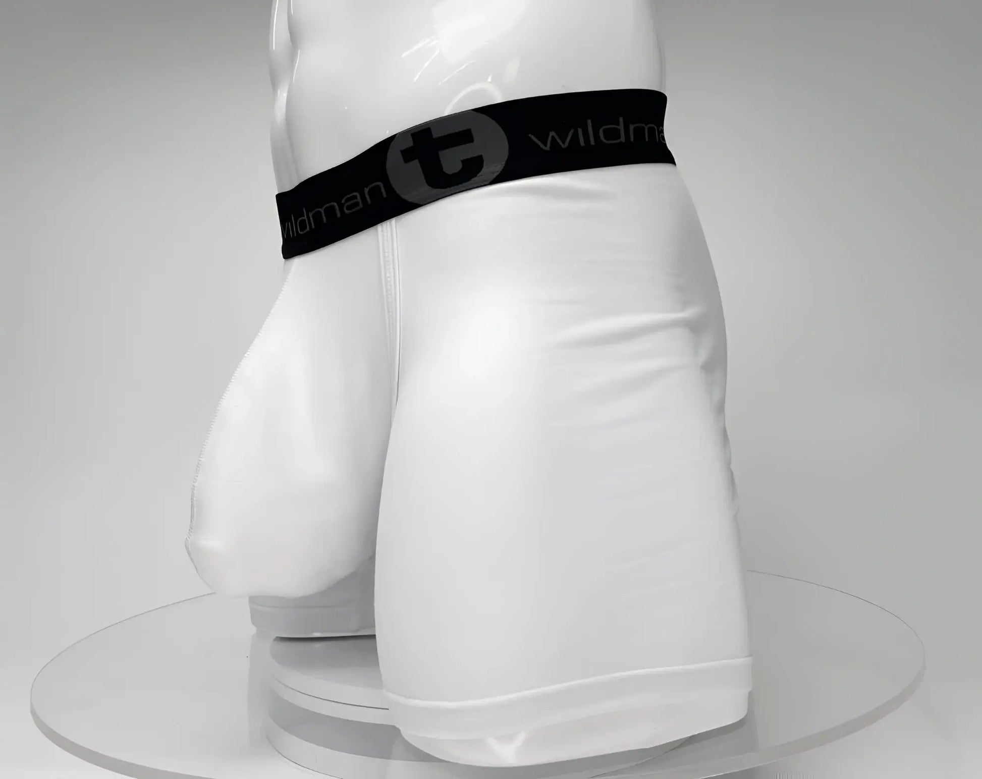 White men’s big boy pouch 5 inch inseam boxer brief with black elastic waistband featuring wildman logo