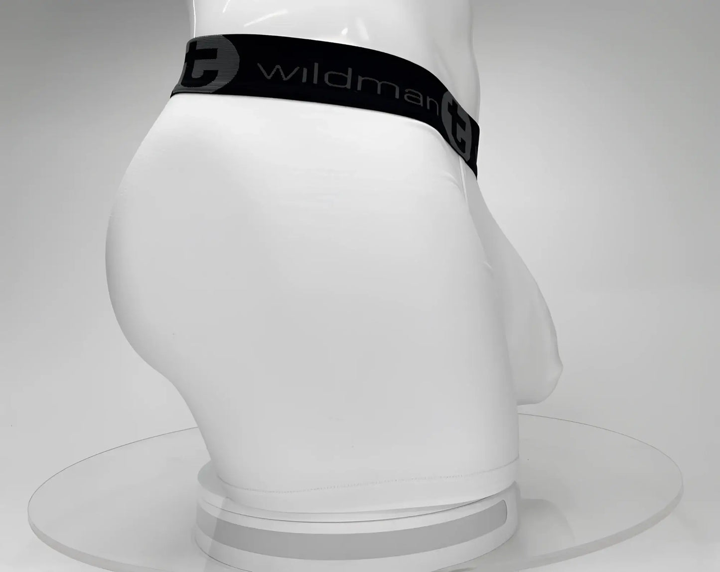 White men’s big boy pouch 5 inch inseam boxer briefs with black wildman waistband and logo in white cotton