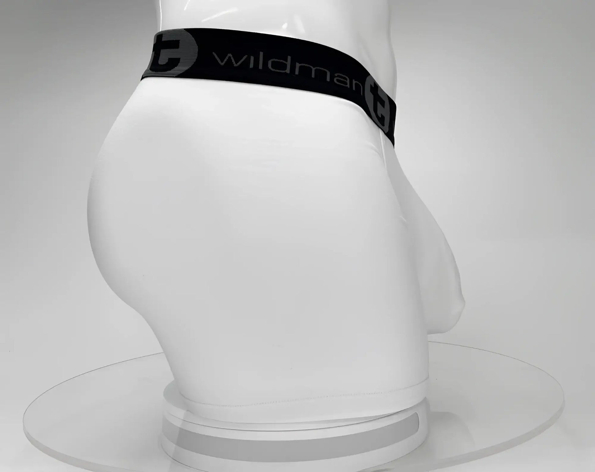 White men’s big boy pouch 5 inch inseam boxer briefs with black wildman waistband and logo in white cotton
