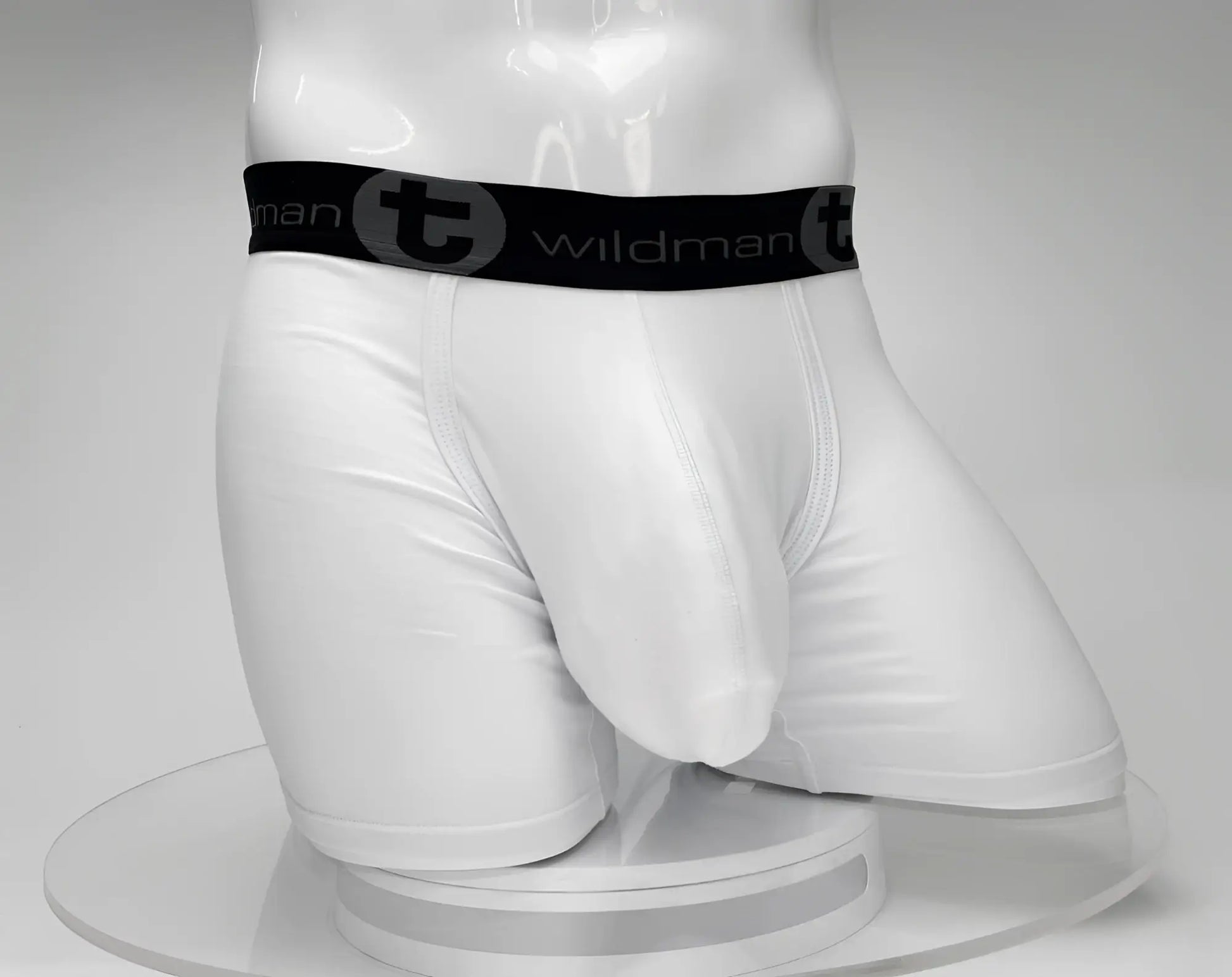 White big boy pouch 5 inch inseam boxer brief with black elastic waistband and wildman logo emblem