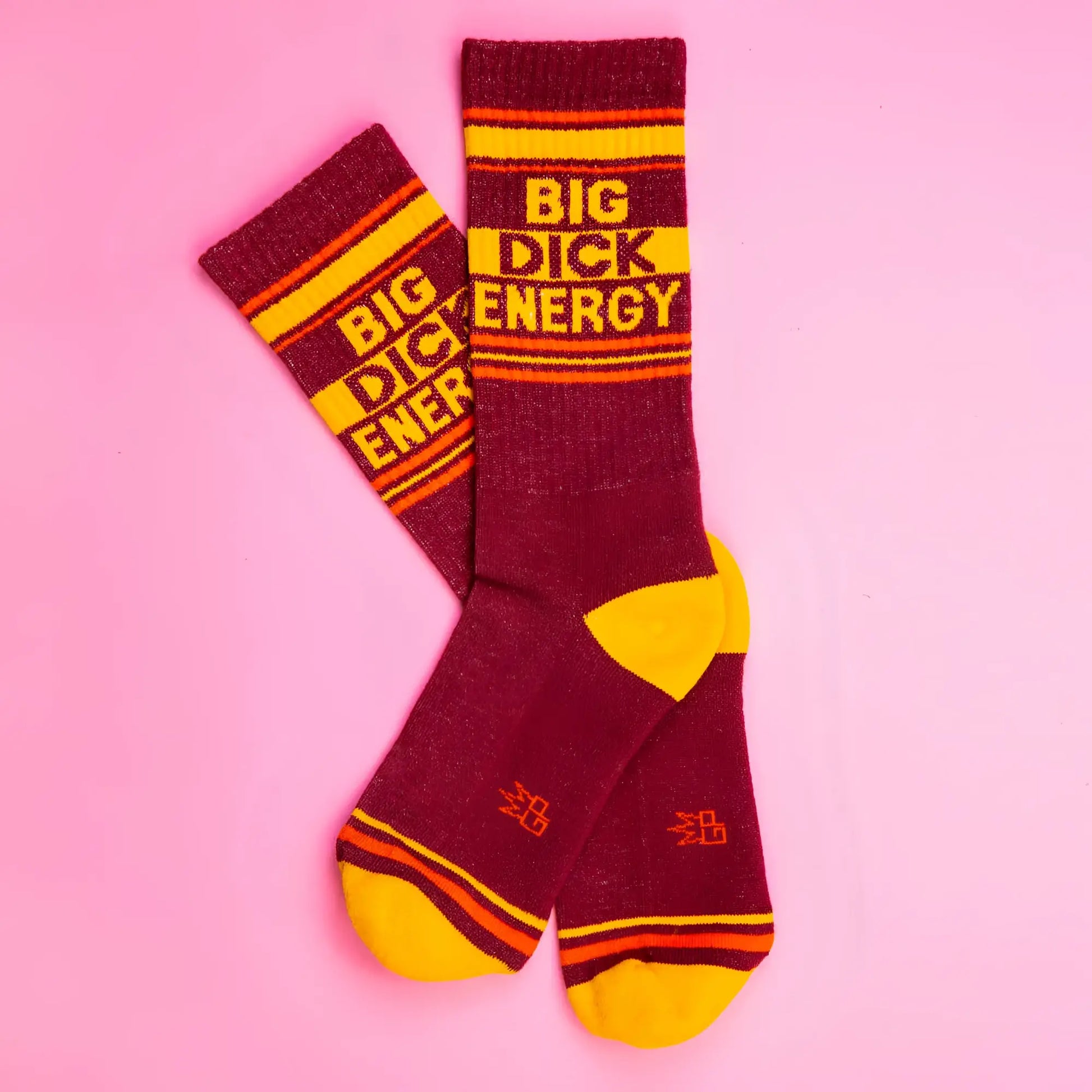 Maroon and yellow big dick energy crew socks with orange stripes designed for comfortable everyday wear