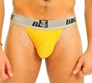 Yellow mesh bike brief with gray waistband black bike branding and small label in size l performance cotton jock strap