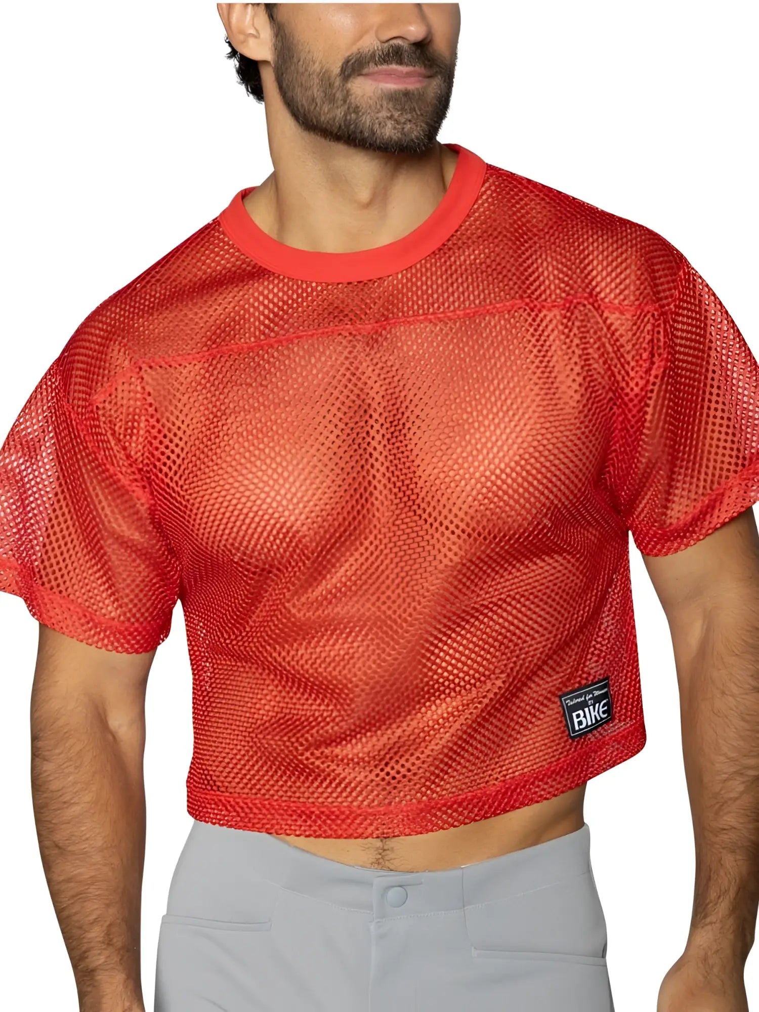 Red mesh crop top with solid ribbed neckline and hem featuring black bike brand patch in bright red color