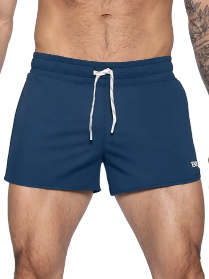 Navy blue BIKE athletic BAM200 track shorts with white drawstring and small logo ideal for active use