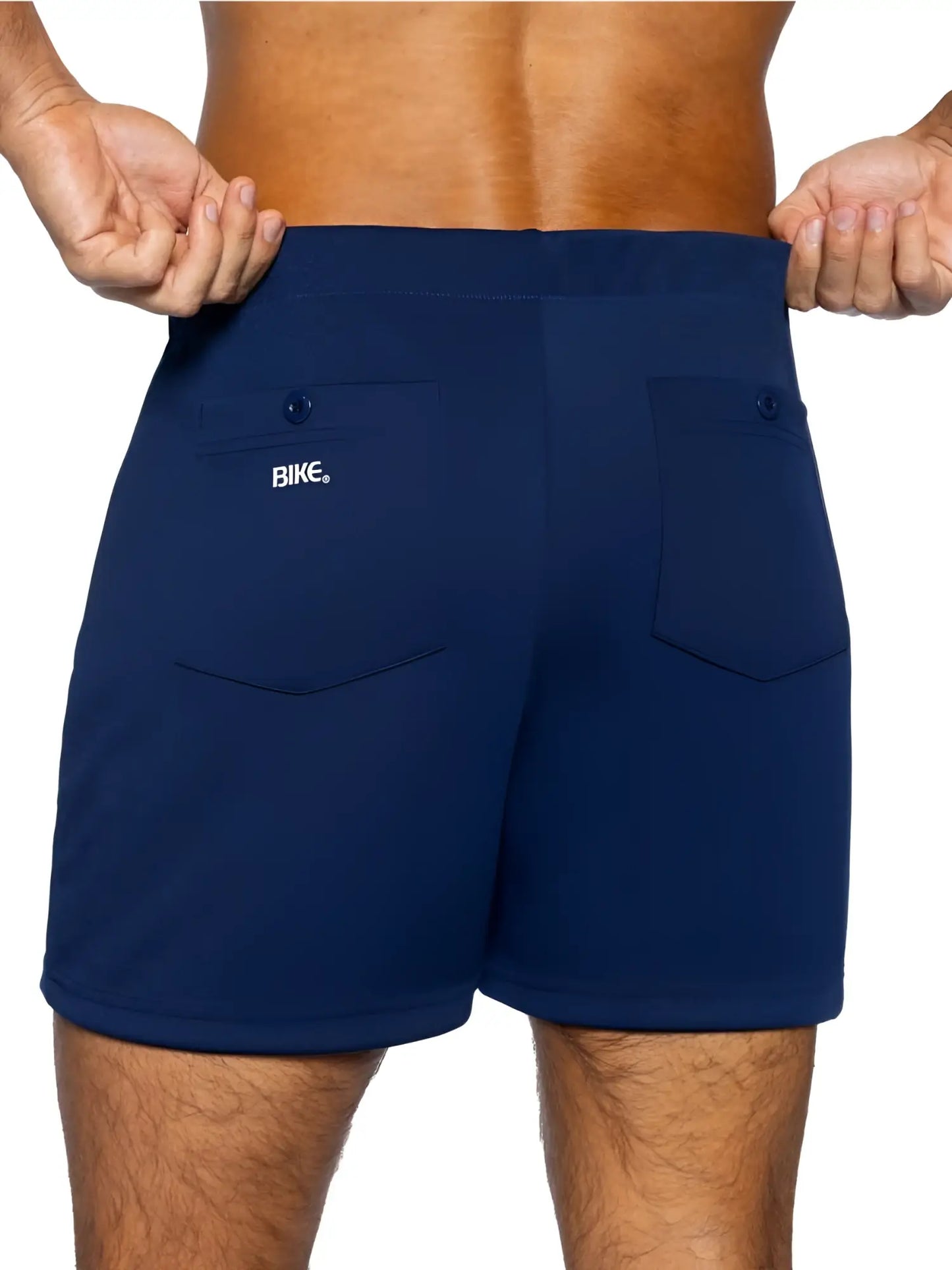 Back view of navy bike athletic bam207 coaches shorts with two pockets and white bike logo on left pocket