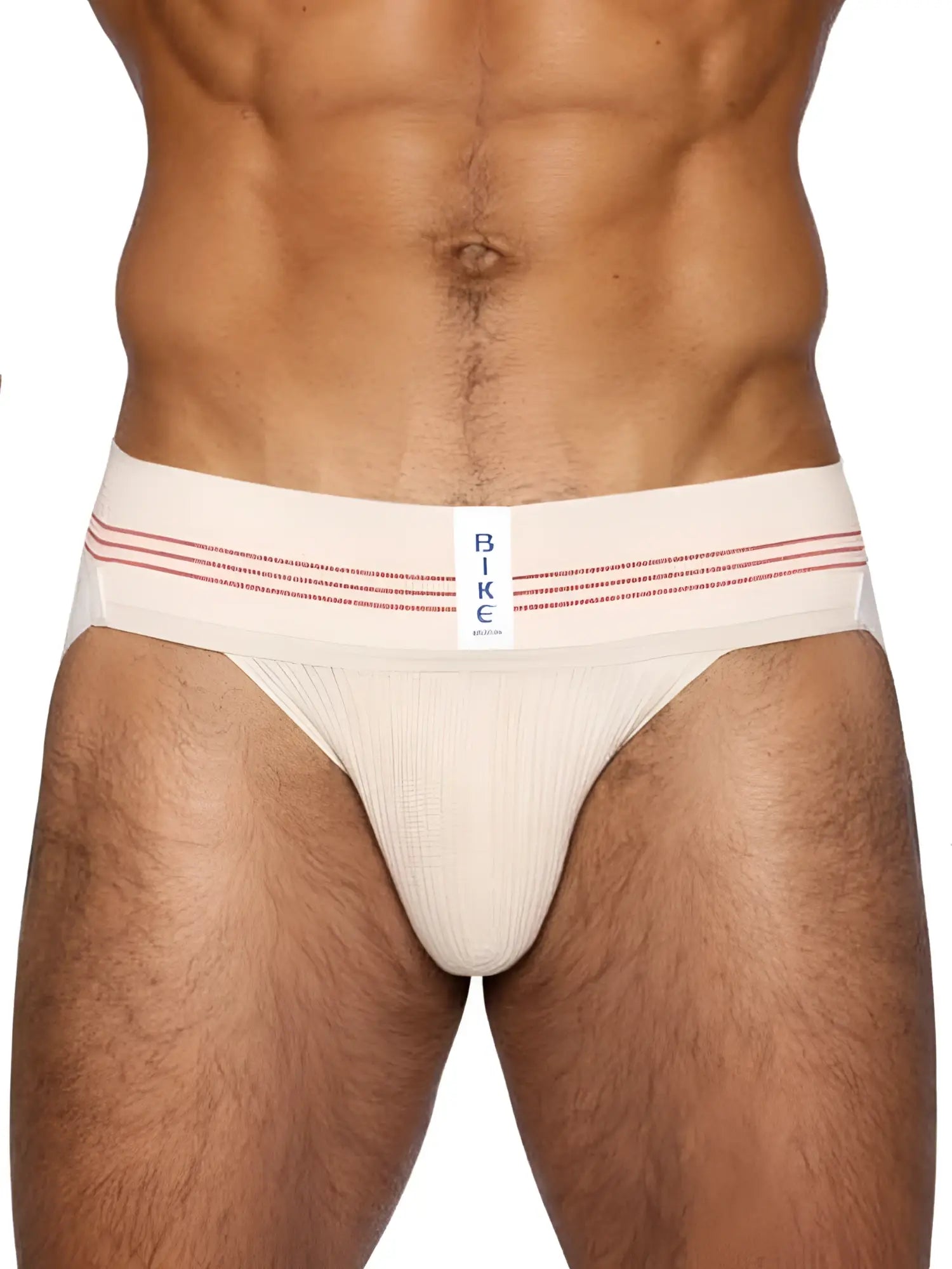 Cream-colored bike athletic briefs with red stripes and a white label in vintage cream classic retro style