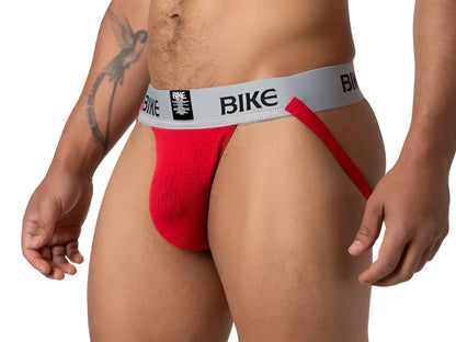 Red bike classic jockstrap featuring a gray waistband and black logo for athletic support and comfort