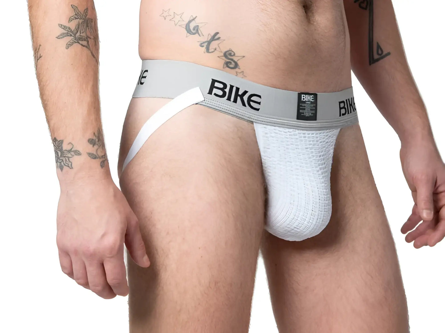 White mesh bike brief with gray waistband and bike branding in the back from BIKE classic jockstrap collection
