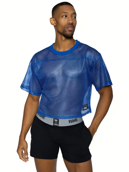 Blue mesh crop top bike practice jersey with solid blue ribbed neckline and sleeve edges for active wear