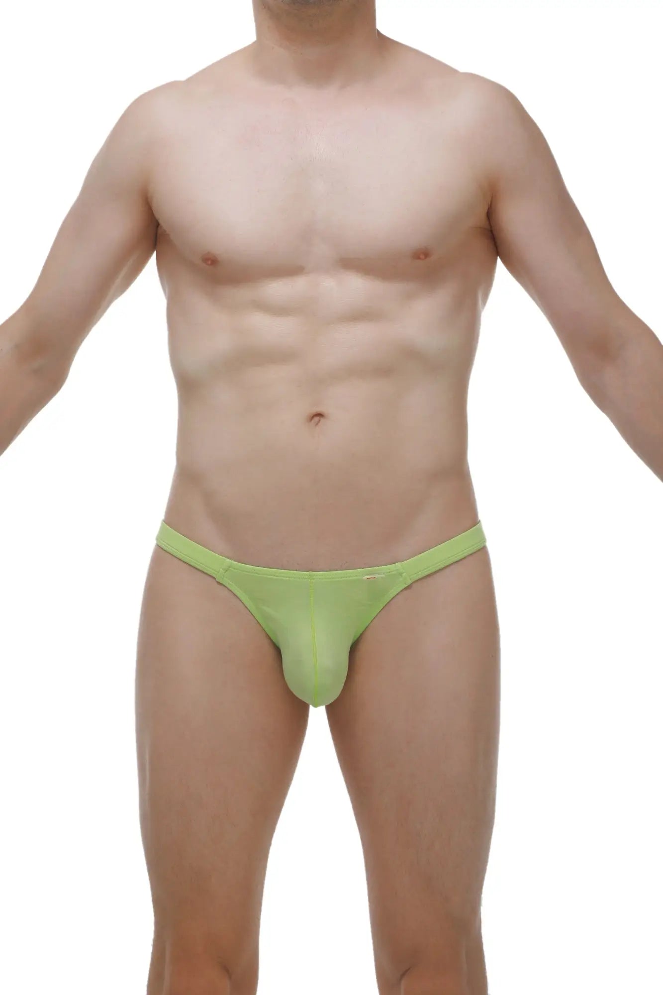 A lime green form-fitting thong made of smooth stretchy bamboo fabric showing the back side of Bikini Bessas Bamboo Apple Green