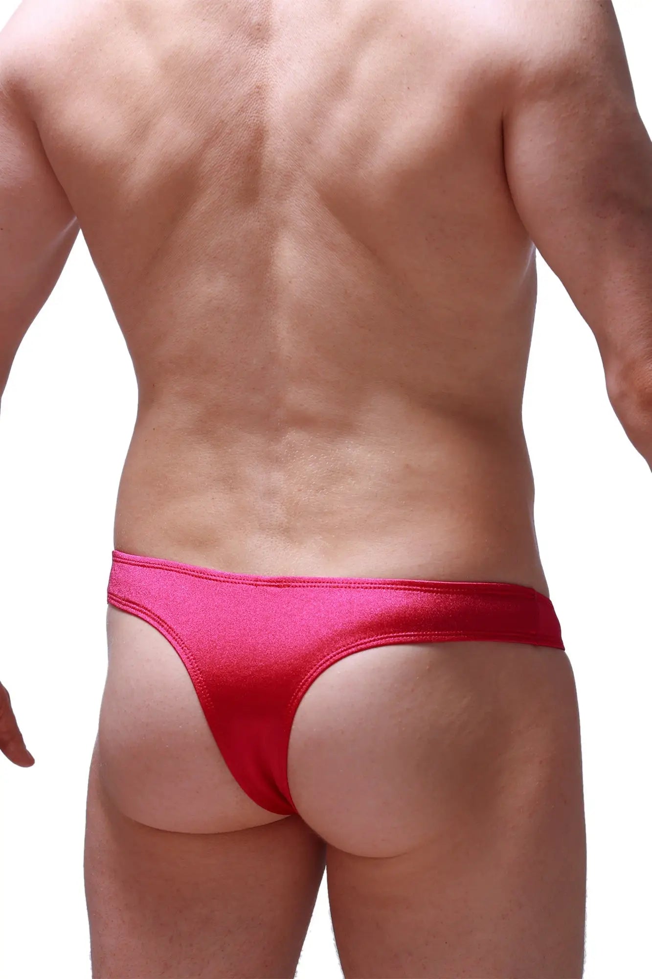 Bright pink satin thong bikini capri joe framboise with a smooth glossy finish shown from the back side
