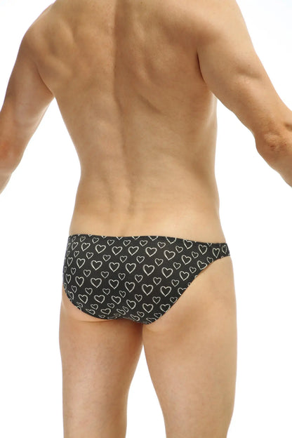 Black bikini briefs dumbo coeur with white outlined heart pattern in soft breathable fabric for everyday wear