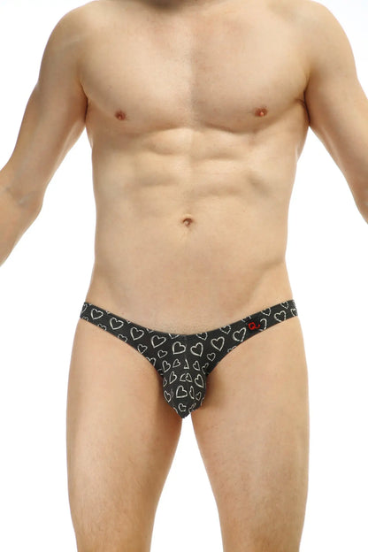 Black thong with white heart pattern from bikini dumbo coeur featuring soft fabric and playful design