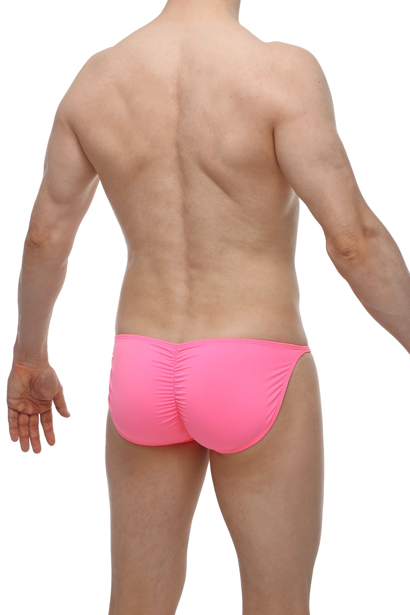 Bright pink bikini lhery bulan swim trunks with ruched back design in form-fitting stretch fabric