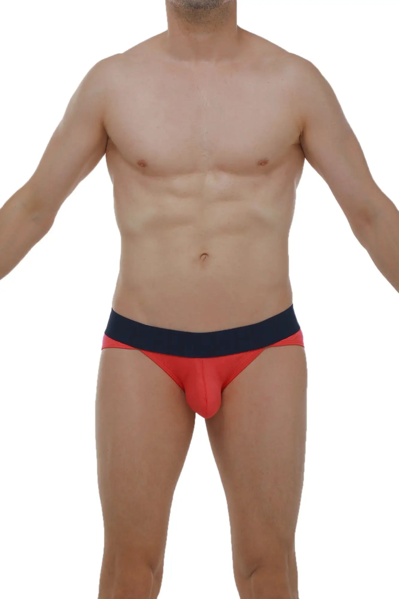 Snug form-fitting red and navy blue briefs featuring a bikini mega bulge design in fuchsia color