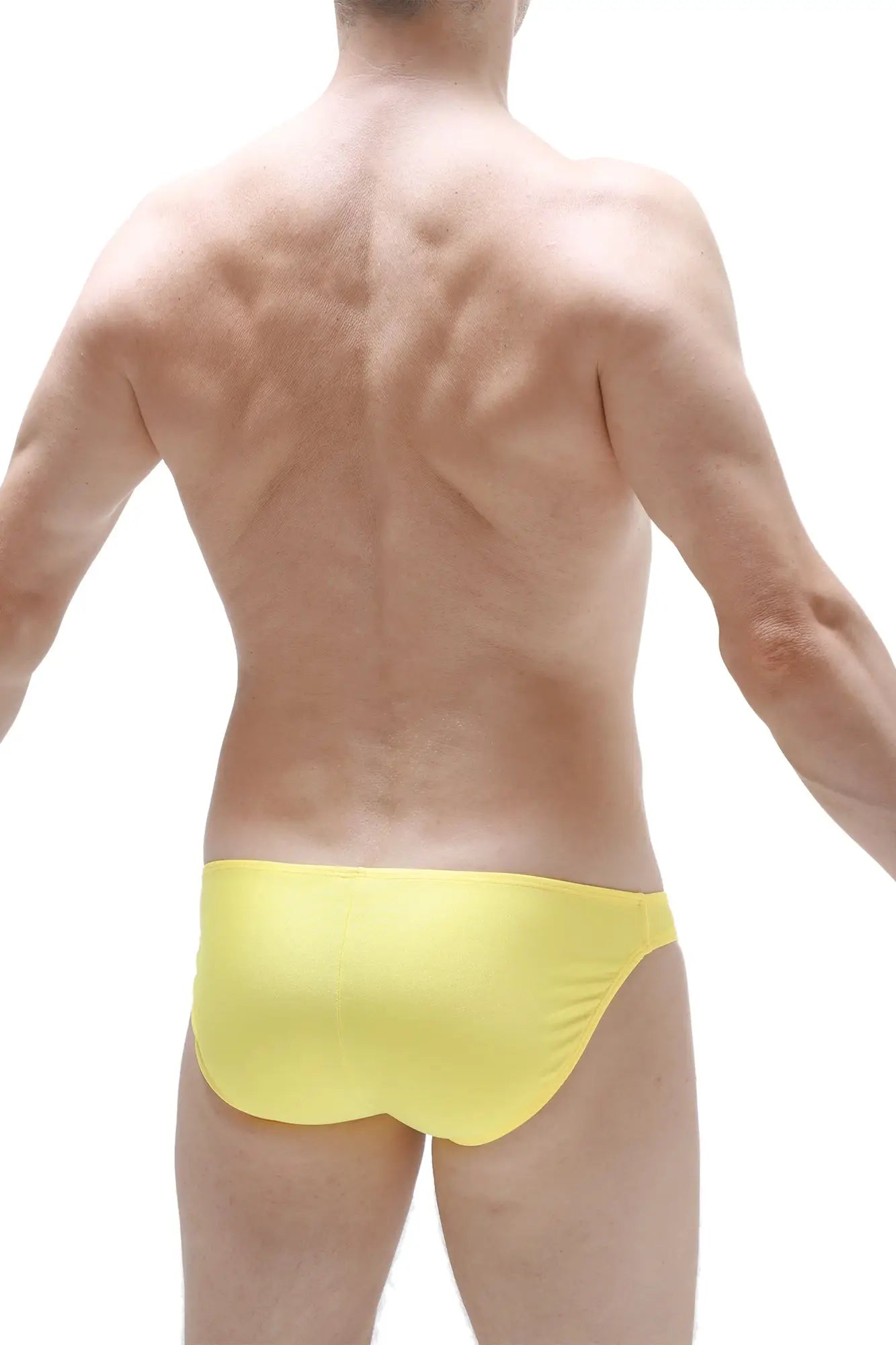 Bright yellow bikini taik joe swim trunks with smooth form-fitting fabric for comfortable beachwear