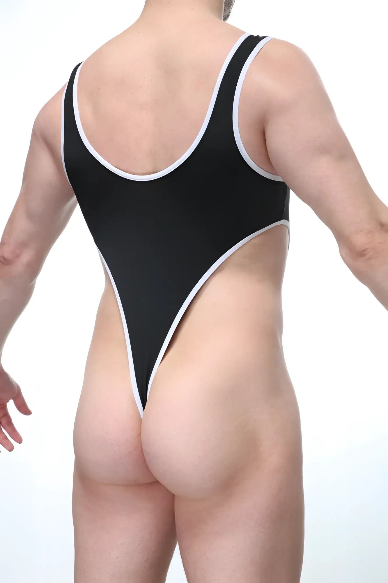 Bodythong carbay black one-piece swimsuit with white trim along neckline armholes and leg openings