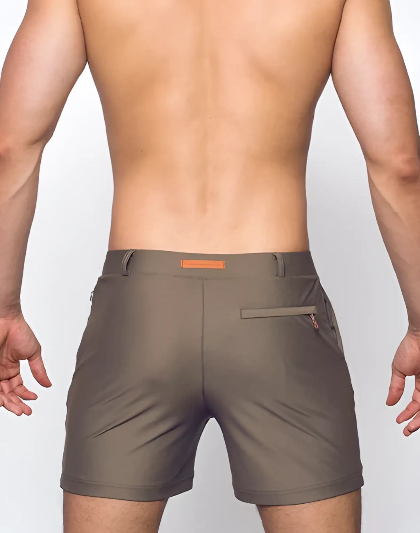 Olive green bondi shorts with subtle orange belt loop and zipper pocket detail for casual wear