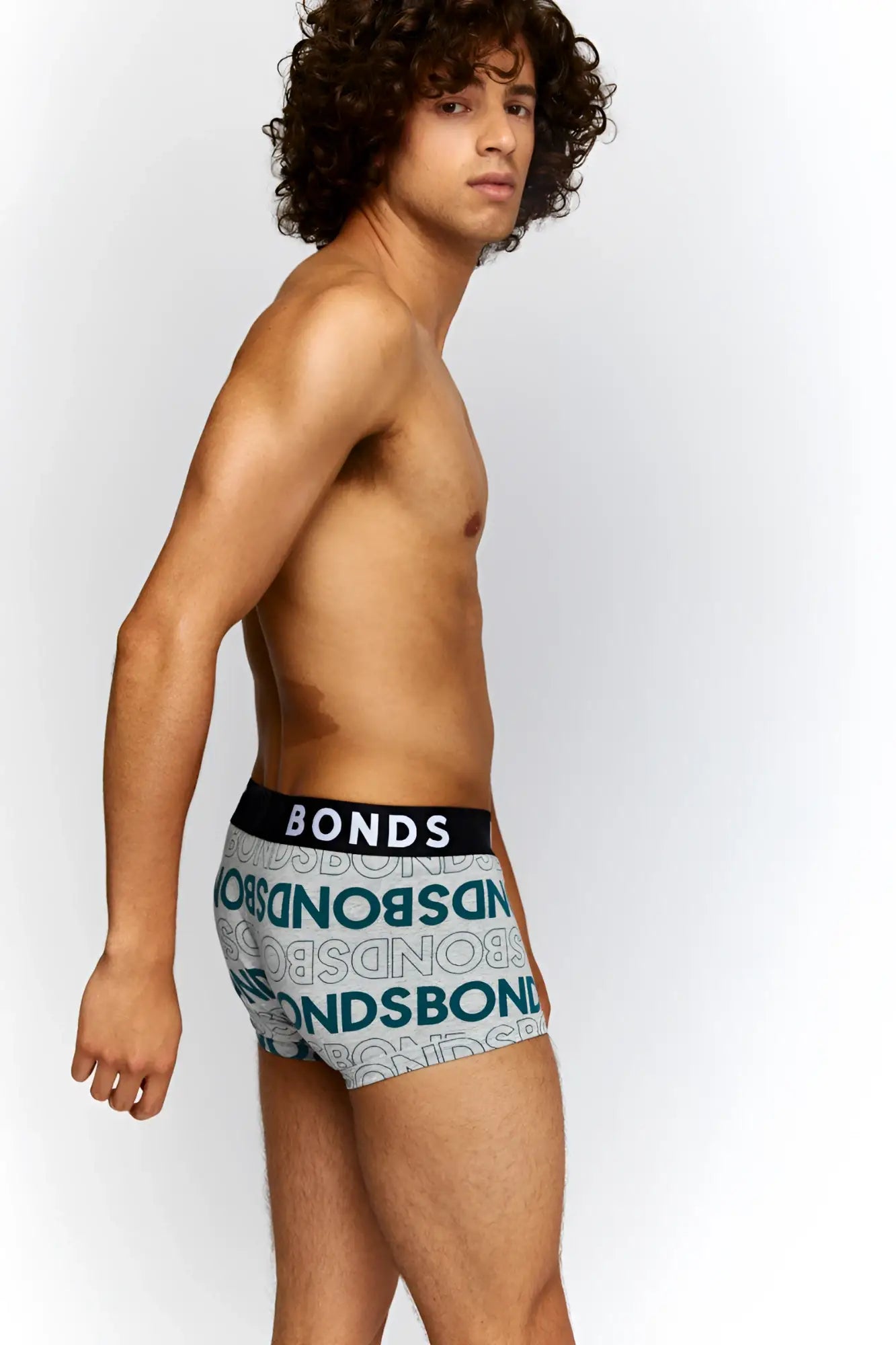 Light blue and white patterned Bonds allover logo fit trunk underwear with black waistband size M