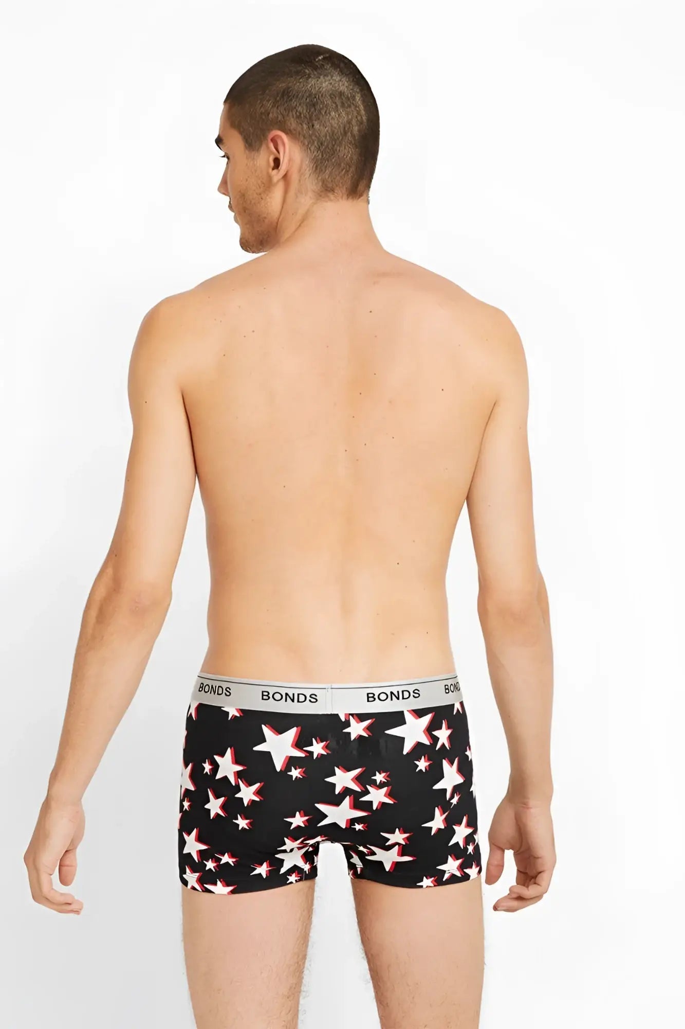 Black bonds guyfront trunk boxer briefs with white stars outlined in red and a silver branded waistband size l
