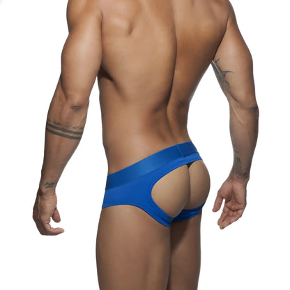 Bright blue bottomless fetish brief swim trunks with distinctive cutout design in form-fitting fabric