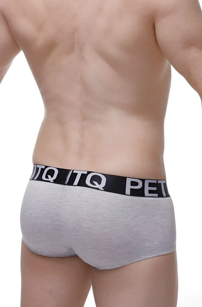 Gray heathered boxer anla modal briefs with black elastic waistband featuring white itq and pet lettering