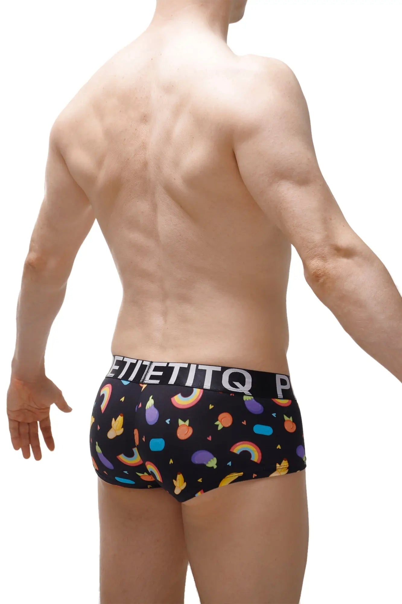 Black men’s boxer brief taik sitges with colorful rainbows fruits and geometric shapes on soft fabric