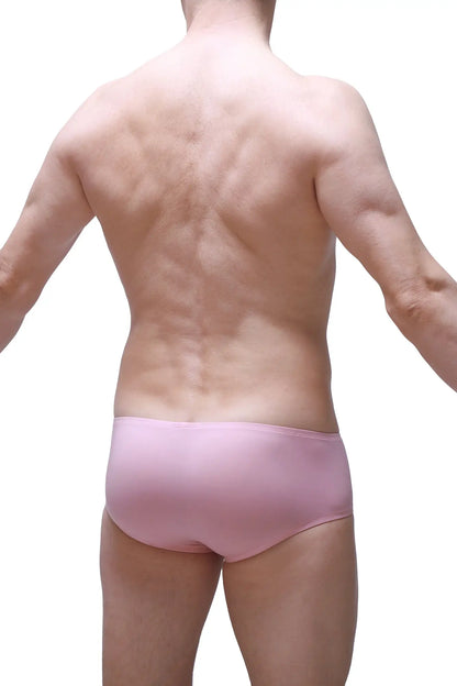 A pair of soft pink boxer chill skine tea rose briefs with a smooth form-fitting design