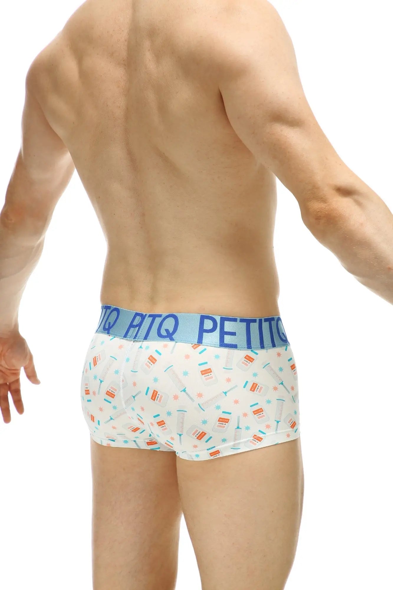 White men’s briefs with colorful candy pattern and light blue petitq waistband titled boxer covid vaccine