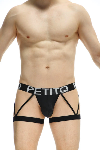 Black petitq boxer nanthiat men’s briefs with strappy crisscross design and white lettering on waistband