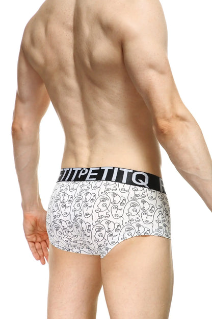 White boxer briefs with black line-art faces and petitq printed on the white elastic waistband in bold letters