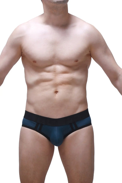 Dark blue athletic briefs with a black elastic waistband and subtle geometric pattern accents in prussian blue