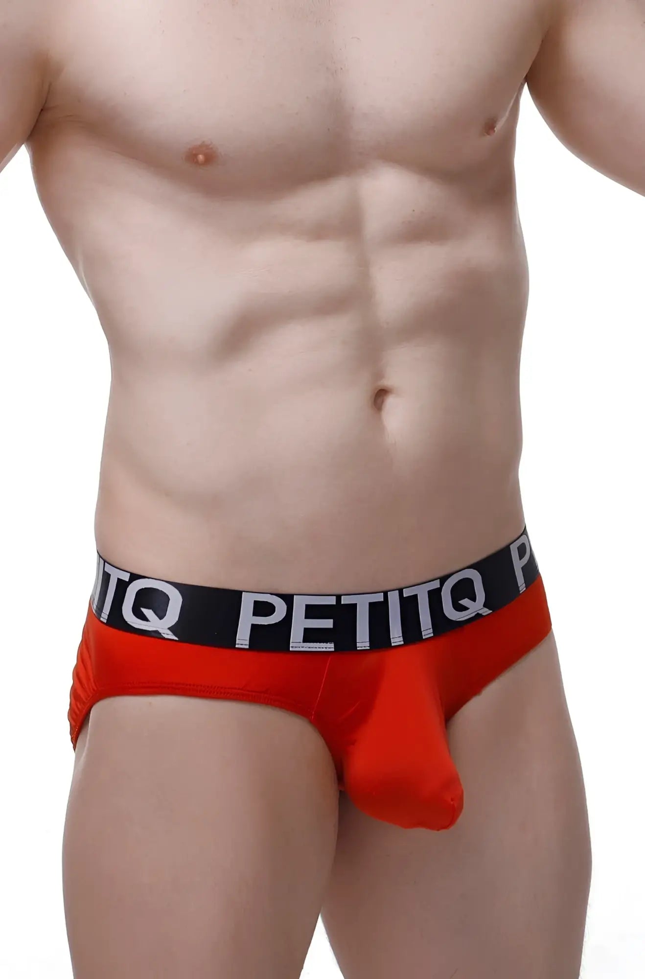 Red petitq men’s briefs with black waistband featuring white lettering from brief bulan plum red collection