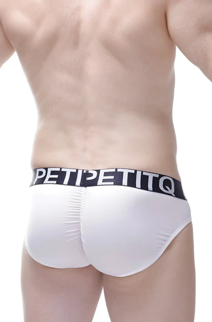 White men’s briefs with a black elastic waistband featuring the petipetitq logo in bold white letters